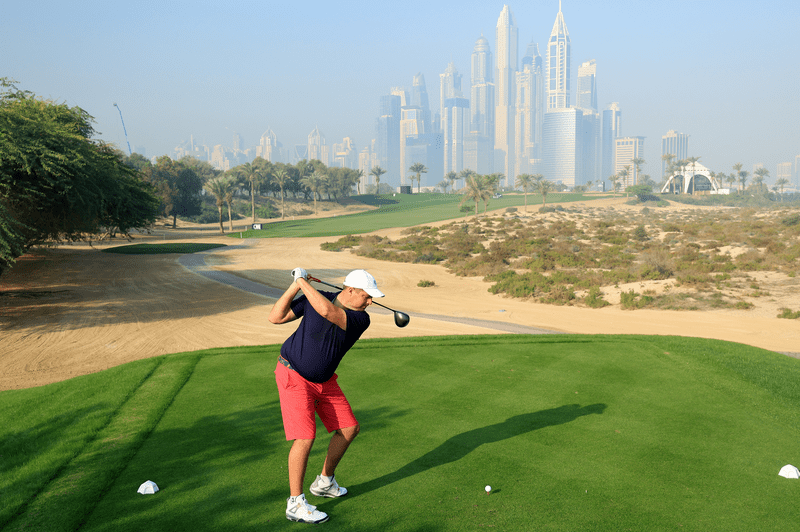 Man playing golf in Dubai