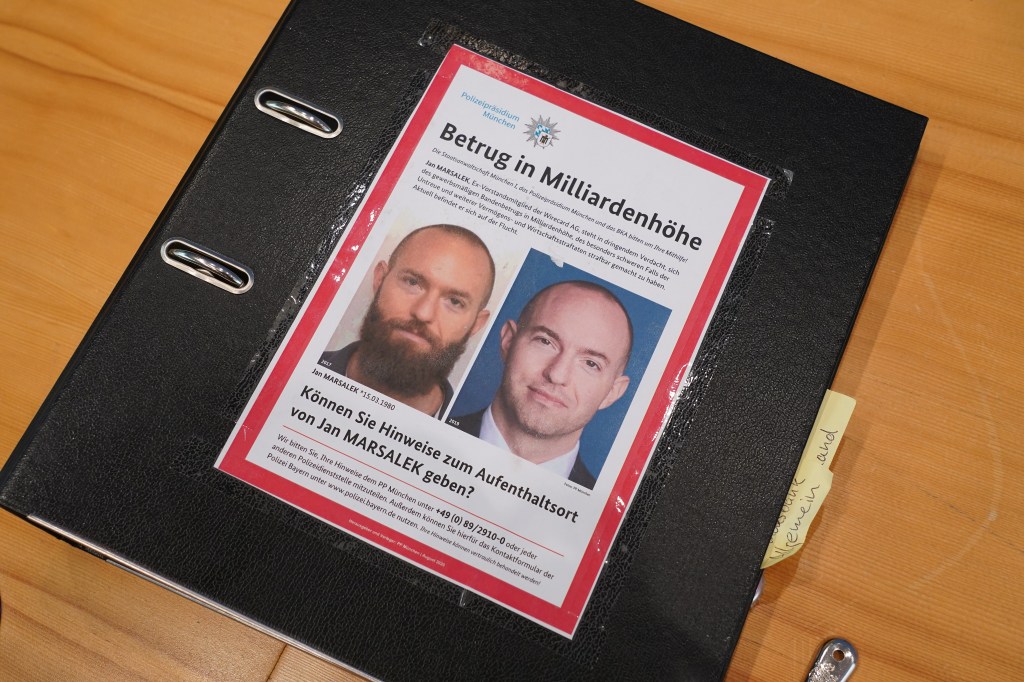 Wirecard trial folder showing wanted men