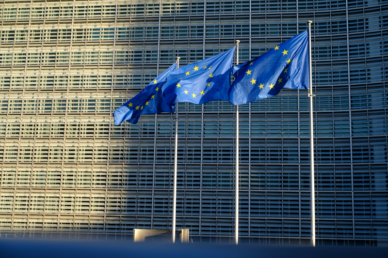 U flags fly outside the Berlaymont, the headquarters of the EU Commission in Brussels