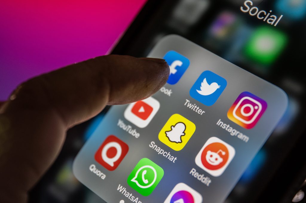 Image of a mobile phone showing some apps