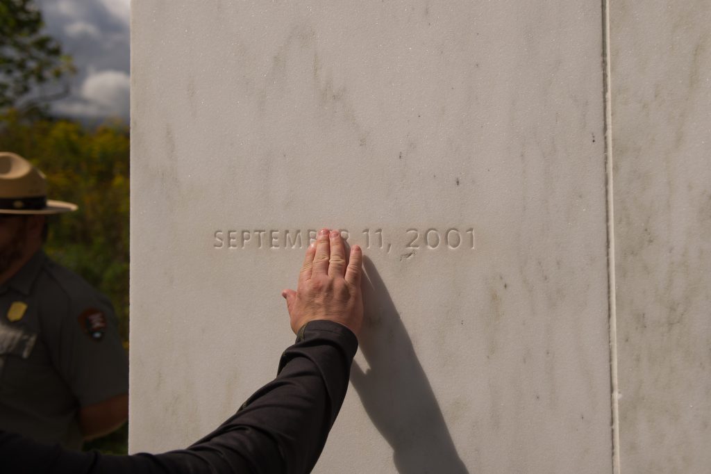 Image of the date "September 11, 2002," engraved in stone.