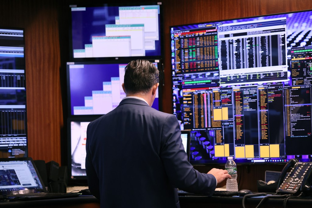 Trading screens at NYSE