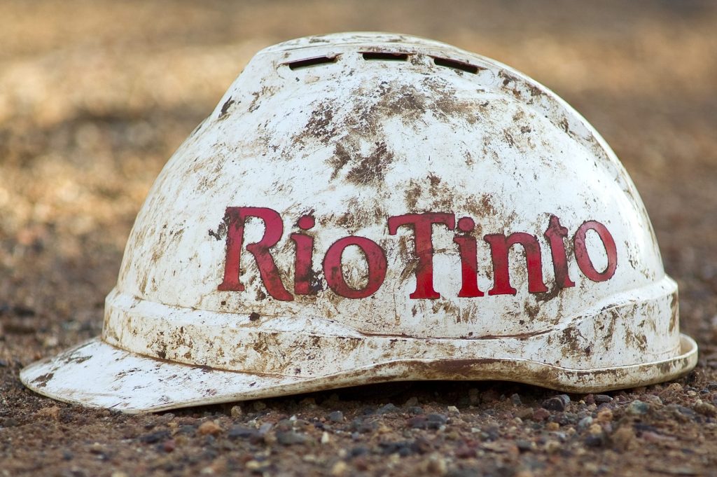 Image of a hardhat saying "Rio Tinto."