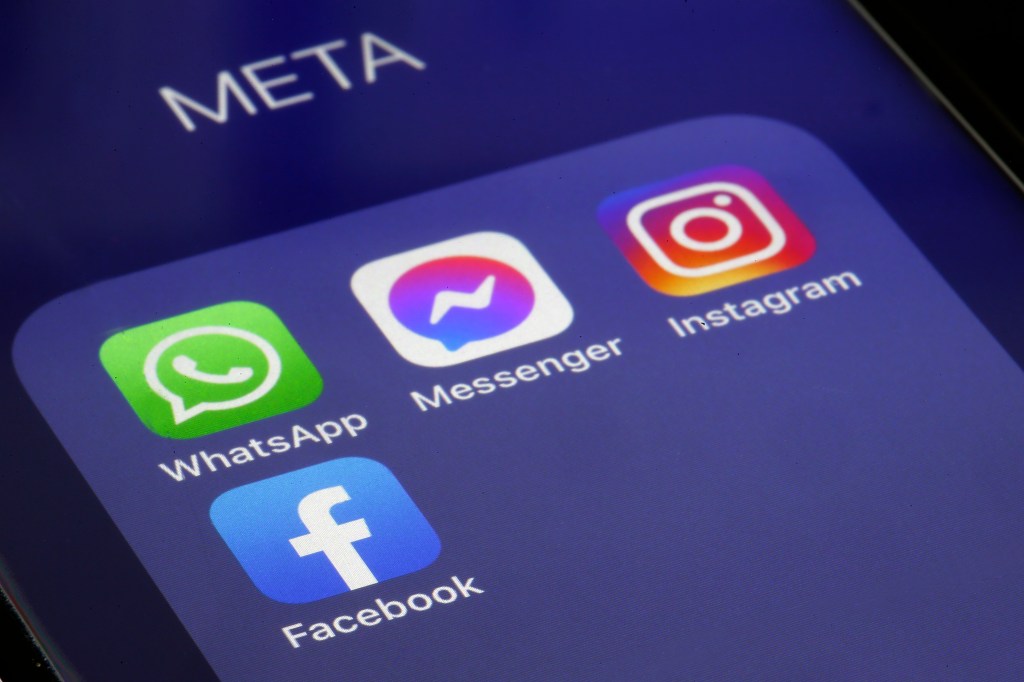 Mobile screen with Meta the apps WhatsApp, Messenger, Instagram and facebook.