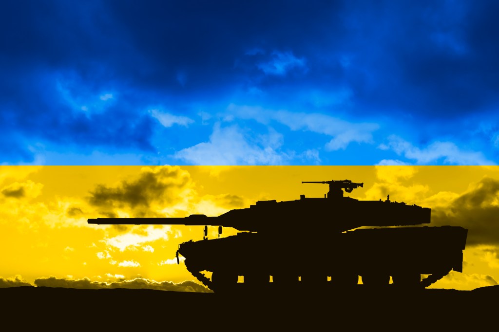 Tank silhouette against Ukraine flag
