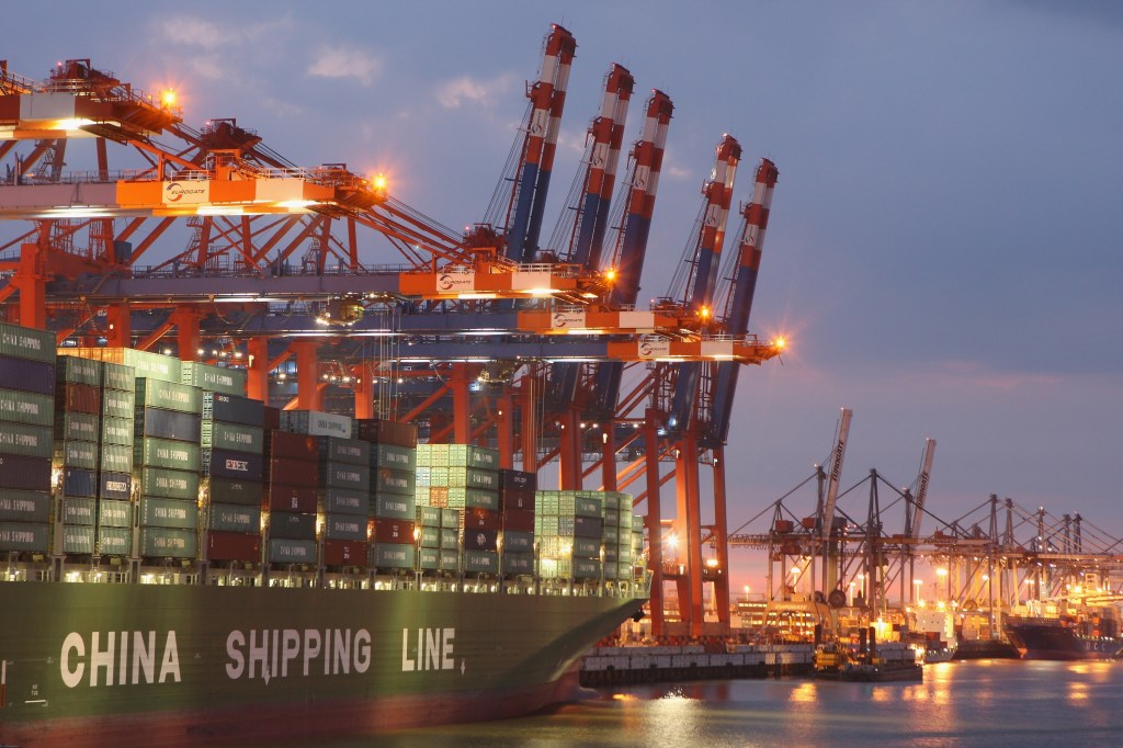 Image of container ships at a port.