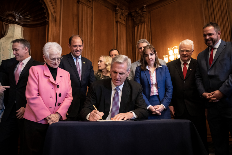 Speaker of the House Kevin McCarthy (R-CA) signs a resolution passed by the House and Senate that aims to block a Biden administration rule encouraging retirement managers to consider environmental, social and corporate governance (ESG) factors when making investment decisions, during a bill signing at the U.S. Capitol March 9, 2023 in Washington, DC.