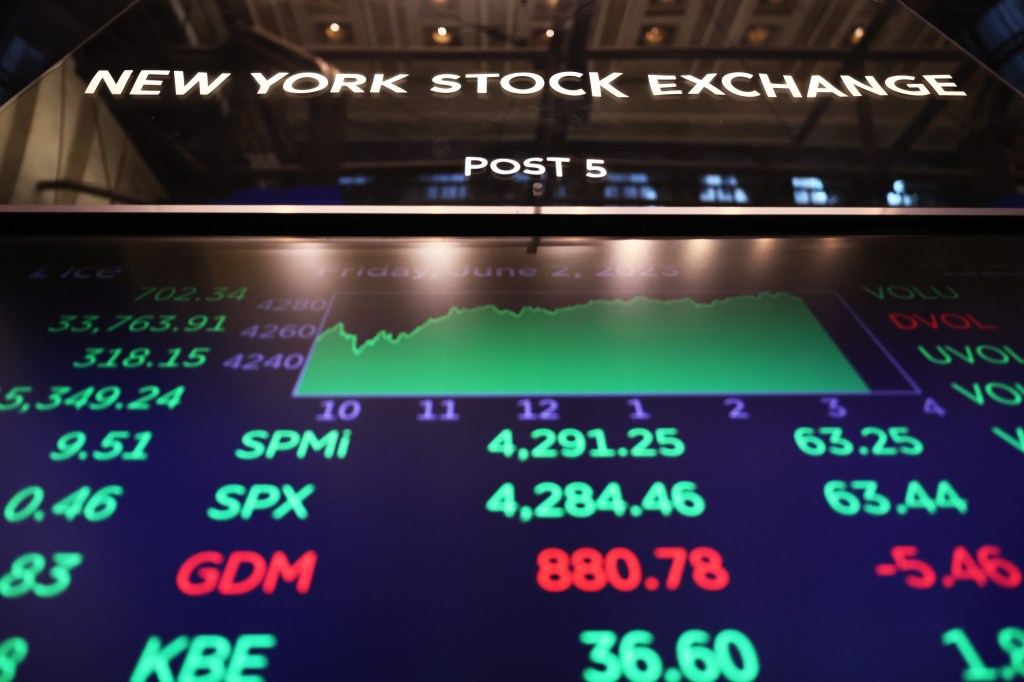 Image of the big board listing stocks at the NYSE.