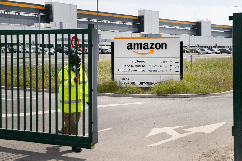 The logo of Amazon is seen at the entrance of the company logistics center in Bretigny-sur-Orge, France. T