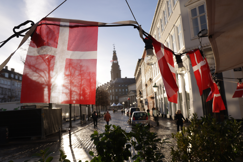 Danish flags hangs outside in Copenhagen, Denmark.