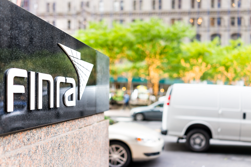 FINRA sign and traffic.