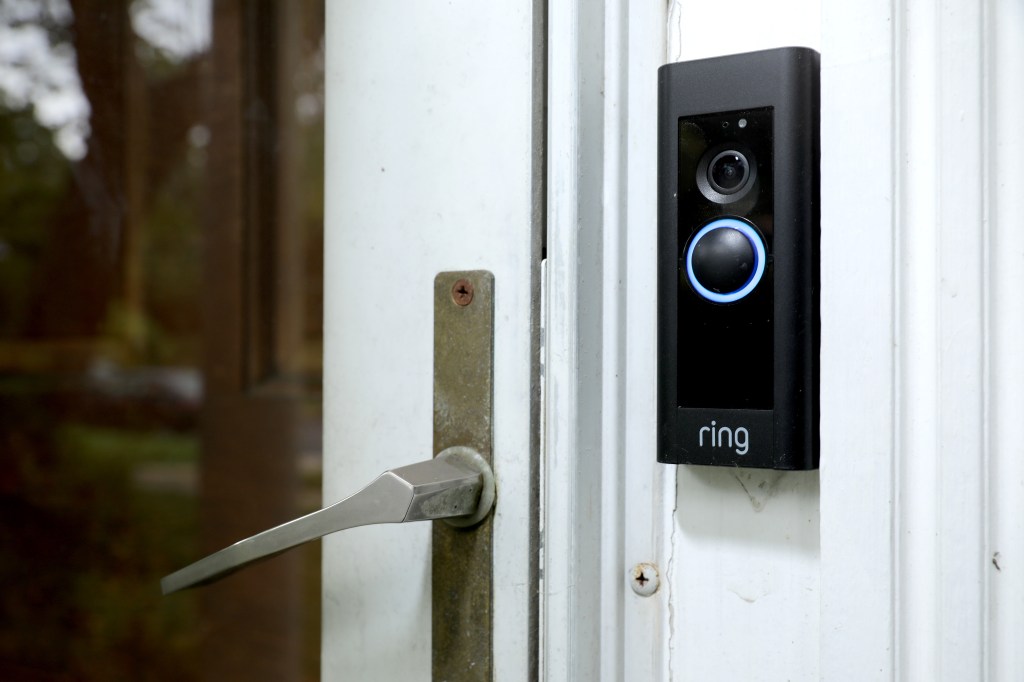 Image of a doorbell device with a built-in camera made by home security company Ring.