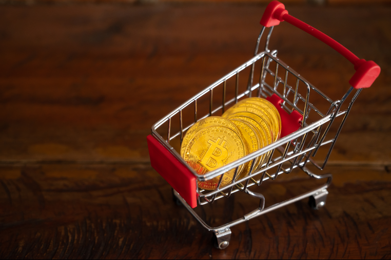 Bitcoin token coin collecting in small trolley