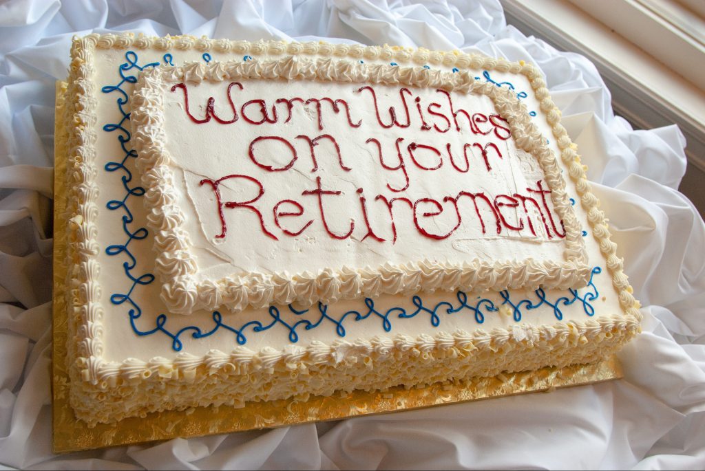 Picture of a happy retirement message on a cake.