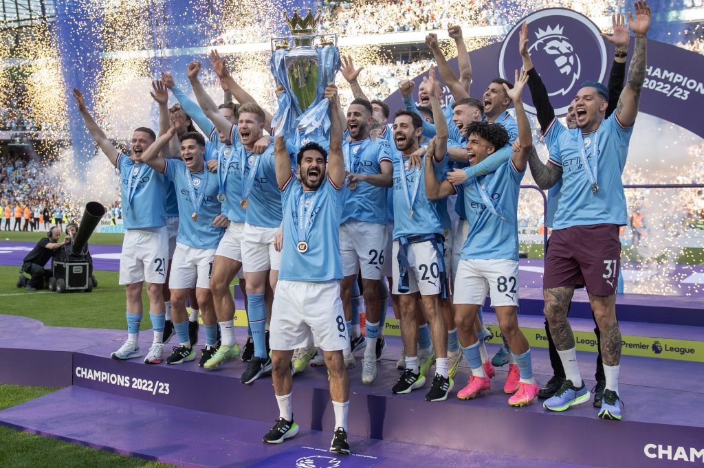Manchester City with Premier League trophy