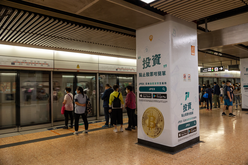 People at the MTR Mong Kok Station in Kowloon, Hong Kong.
