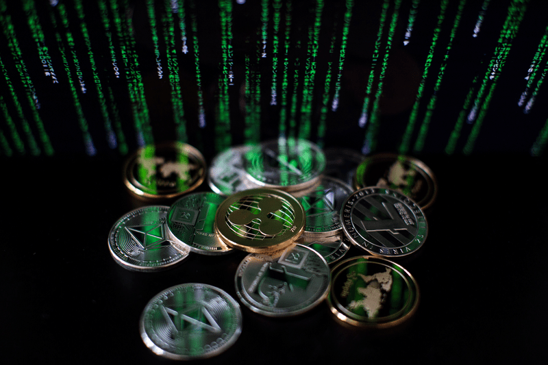 Photo illustration of crypto coins linked in a blockchain.