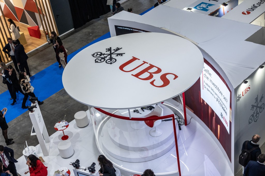 Image of the UBS logo on a display stand.