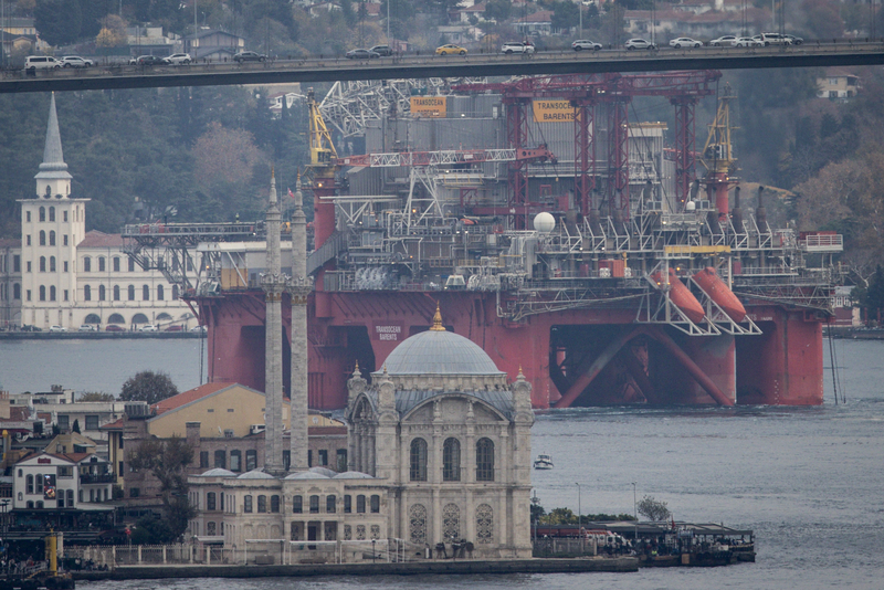 The Transocean Barents, Harsh-environments, ultra deepwater semi-submersible drilling rig is escorted by pilot boats as it navigates the Bosphorus Strait on November 14, 2024 in Istanbul, Turkey. The 77-meter wide and 60-meter high drilling rig passed the Bosphorus enroute to Romania from Spain.