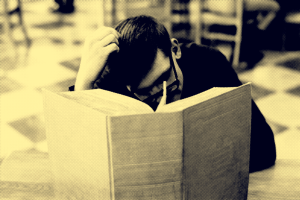 Person reading a big book