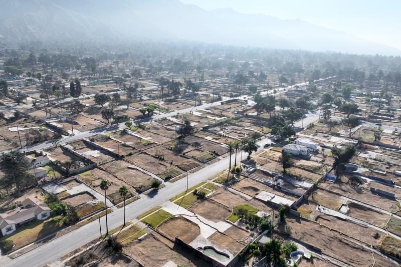 An aerial view of properties cleared of wildfire debris which burned in the Eaton Fire on July 03, 2025 in Altadena, California. The U.S. Army Corps of Engineers has cleared more than 5,000 properties damaged in the Eaton Fire as the six month anniversary of the devastating Los Angeles wildfires approaches.