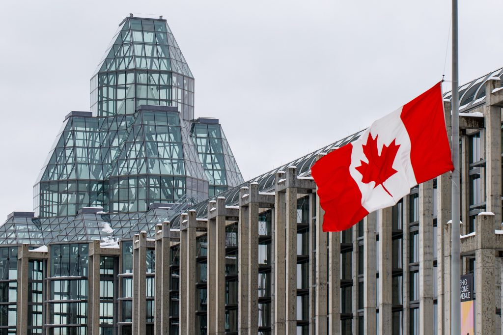 National Gallery of Canada in Ottawa with a Canadian flag in the foreground