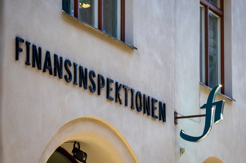 The facade and sign at the headquarters of the Swedish financial authority, Finansinspektionen.