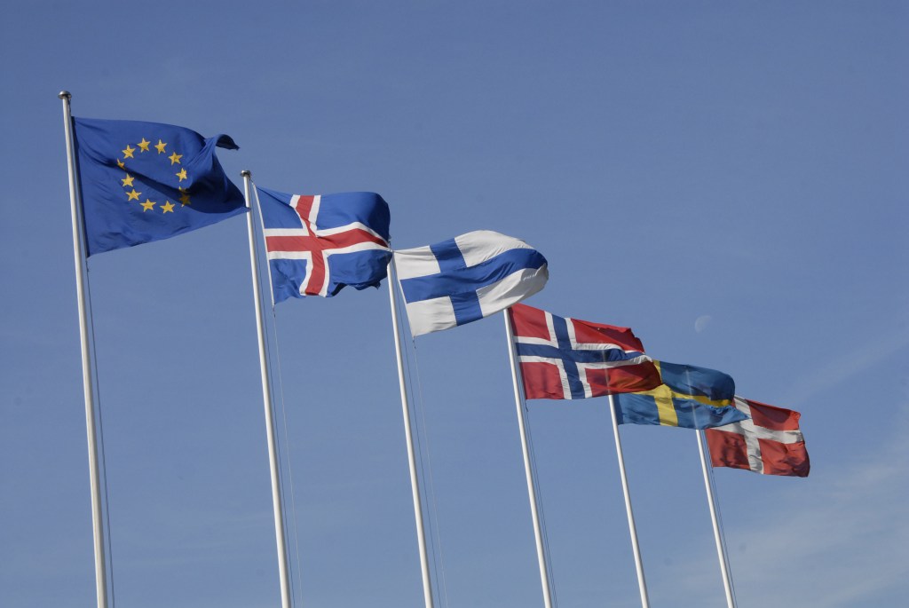Nordic and EU flags on flagpoles