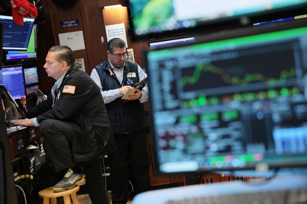 Image of traders working on the floor of the New York Stock Exchange.